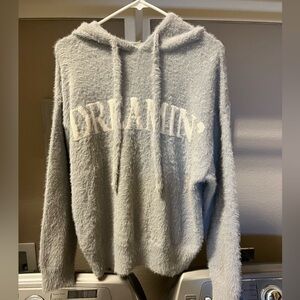 Women’s Jeffie sweater with hood. Size Medium. New with tags. Non smoking home.